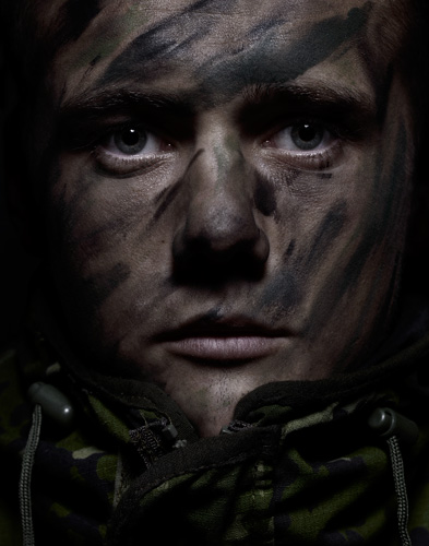 Young male soldier in camouflage copyright portrait photographer Kenneth Rimm